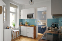 Małe kuchnie w blokach mieszkalnych - jak efektywnie je urządzić?